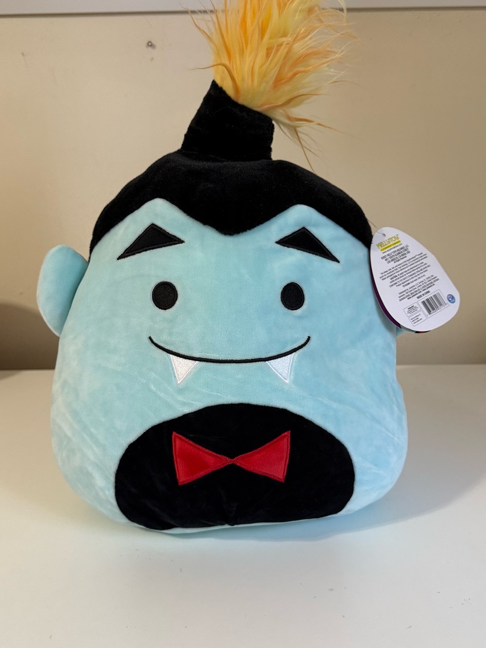 Drake Light Blue Vampire Squishmallow Plush with Black Hair and Red Bow